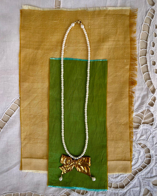 TIED UP IN A BOW NECKLACE