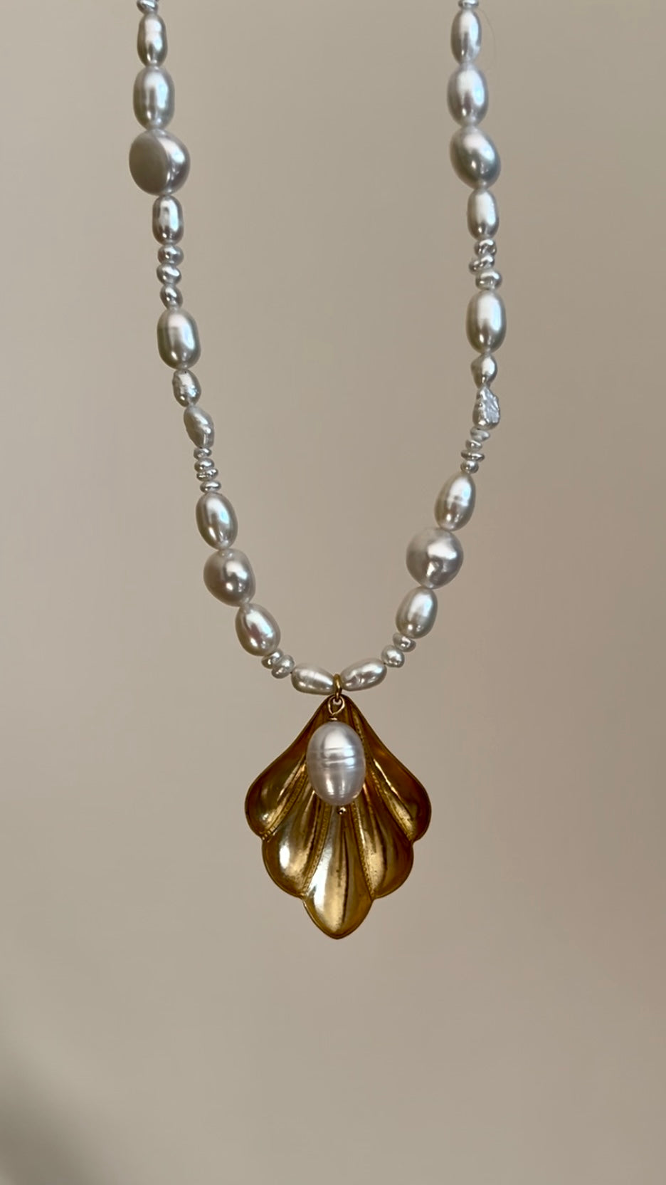 THE WORLD IS YOUR OYSTER NECKLACE